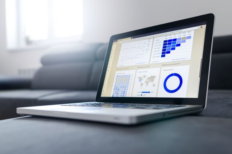 Digital advertising analytics dashboard on a laptop