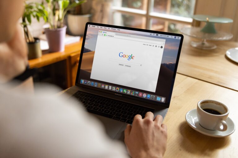 Typing a search query on a laptop