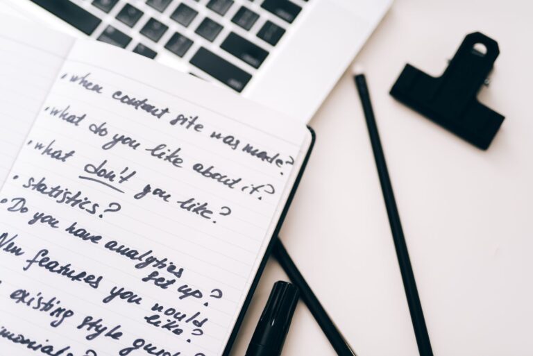 Content strategy planning with a notebook and laptop